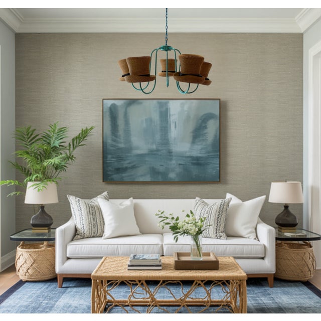 Make a bold statement with this one-of-a-kind glam chandelier, finished in a radiant aqua blue metallic. Designed in the...