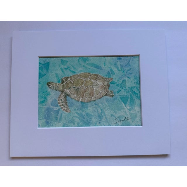 You could say he is swimming or floating but I think it seems like he’s making his way somewhere. Signed, matted and ready...