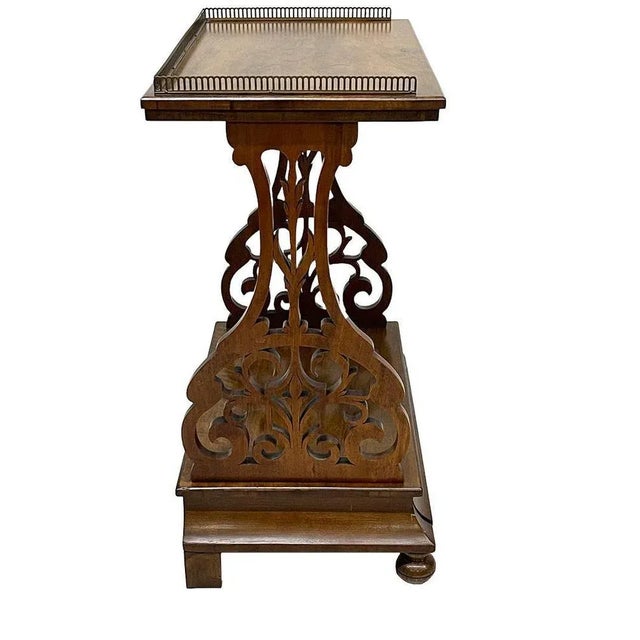 English 19th Century tea table, ca 1880 An English mahogany tea table, raised on two legs on a base with a drawer. The...