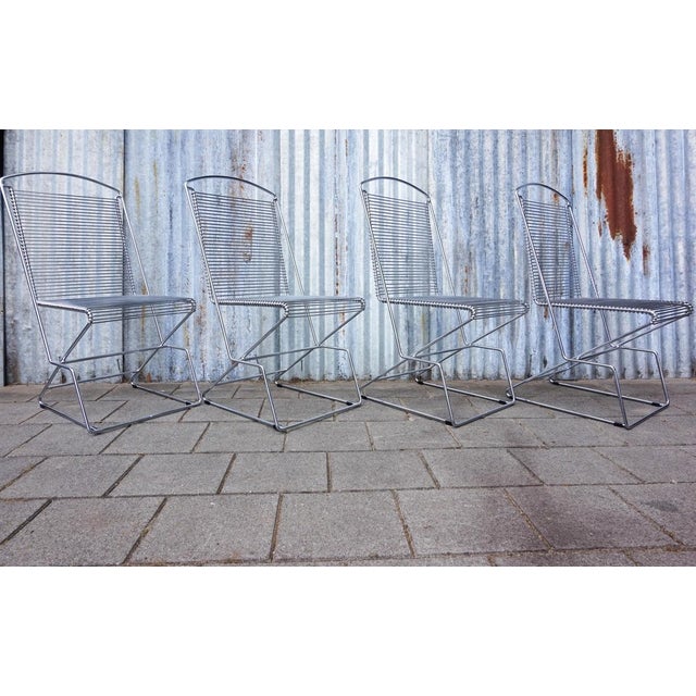 Set of 4 chairs attributed to Till Behrens. Great chairs with an exceptional shape, high quality made of chromed steelwire...