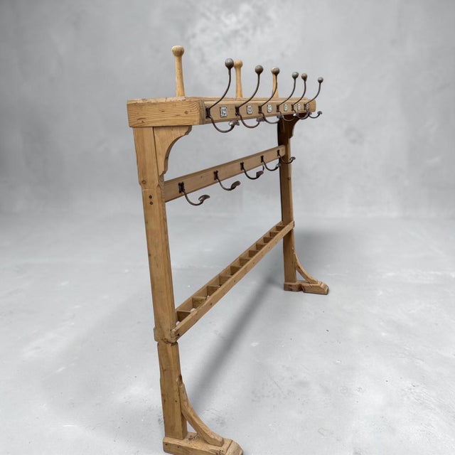 An absolutely gorgeous 1800's antique pine coat rack from a train station in England. Holds coats, hats and umbrellas,...