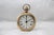 Gold pocket watch shape alarm desk clock Mechanical table clock Brass, glass. France, 1960s. Working condition....
