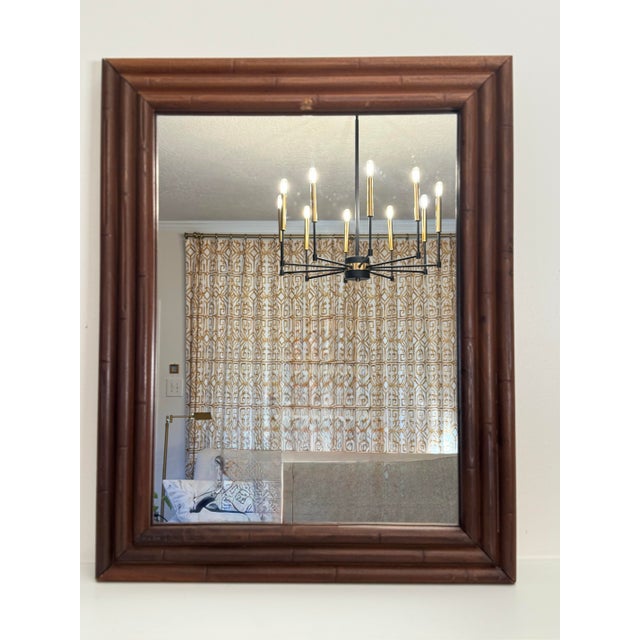 A trio of embossed rows of faux bamboo design gives texture along with a two inch depth border on this vintage wooden...