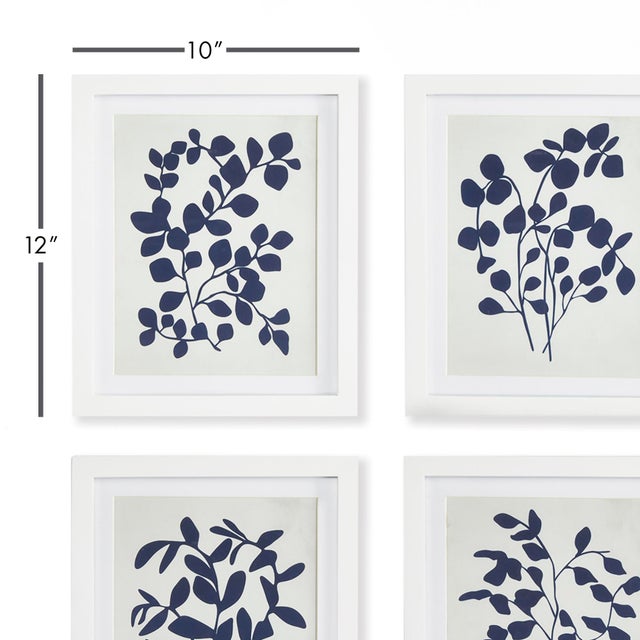 In a rich, ontrend indigo, these botanical profile prints are a clean & classic look for the modern home. A sophisticated...