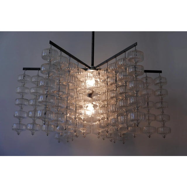 Huge, spectacular Mid Century Modern Chandelier or pendant lamp by Aloys Ferdinand Gangkofner, 1968, Germany. Executed in...