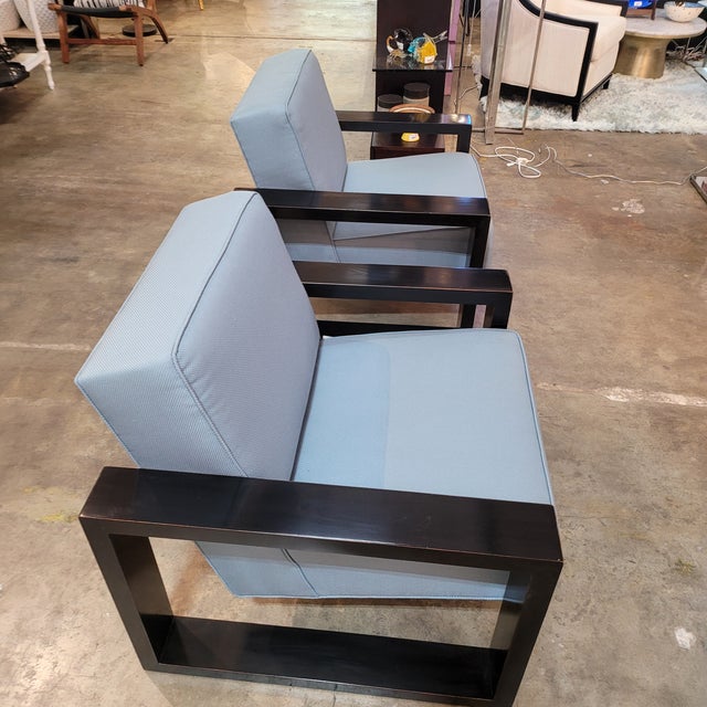 Elevate your space with this stunning pair of Kreiss lounge chairs, where modern minimalism meets timeless craftsmanship....