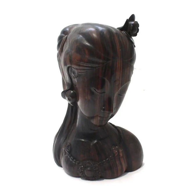 This stylish rosewood figure of a young woman was created in Bali and it will make a subtle statement with its form and...