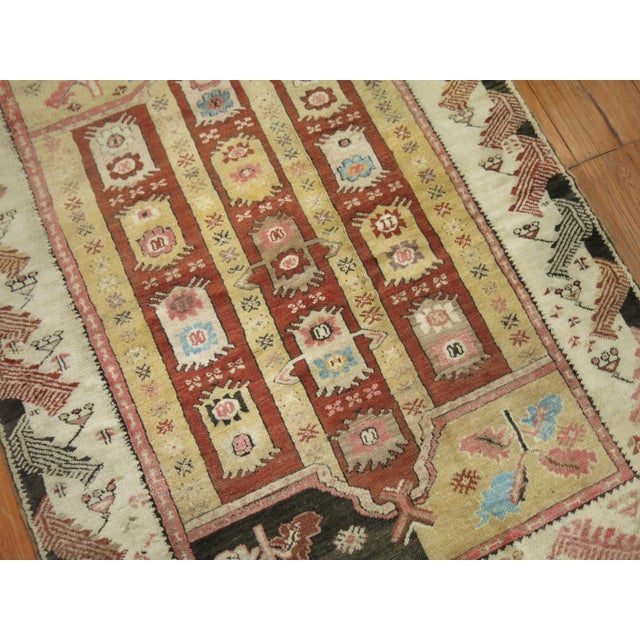 A whimiscal Turkish Scatter size rug from the 1st quarter of the 20th Century Measures: 4'3'' x 5'6''.
