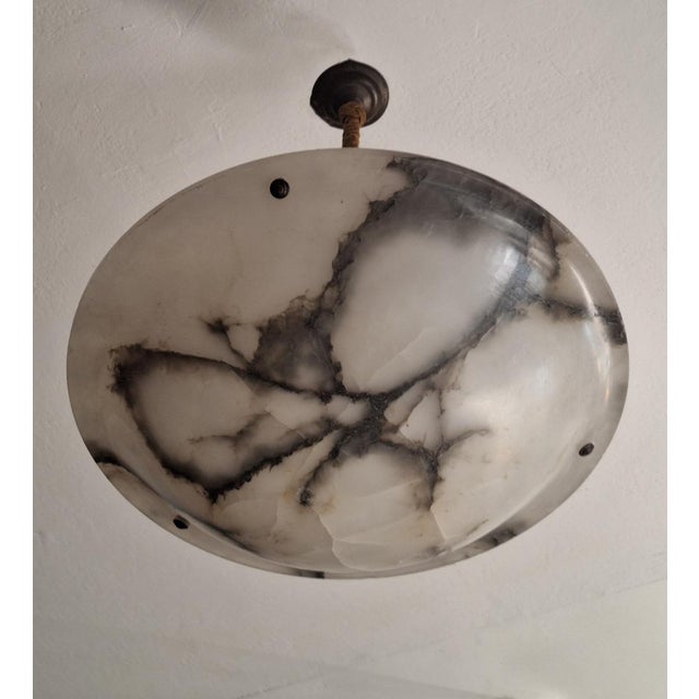 Antique large and impressive beautifully veined alabaster pendant light hanging from its original twisted rope supports...