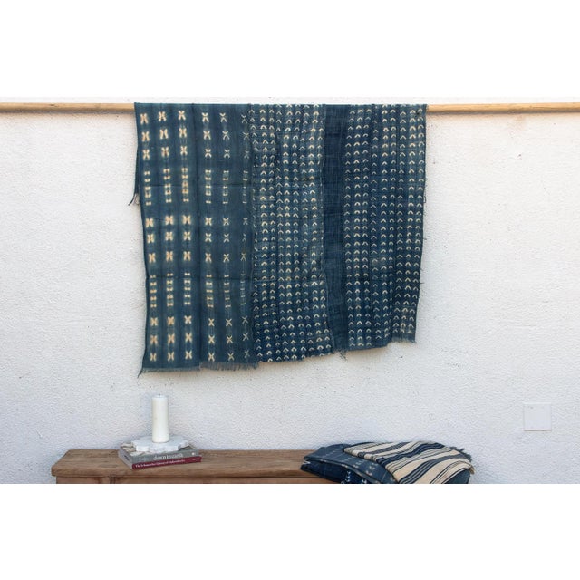 Hand-woven by master weavers of the Mossi and Dioula traditions in Burkina Faso, West Africa, these vintage textiles are...