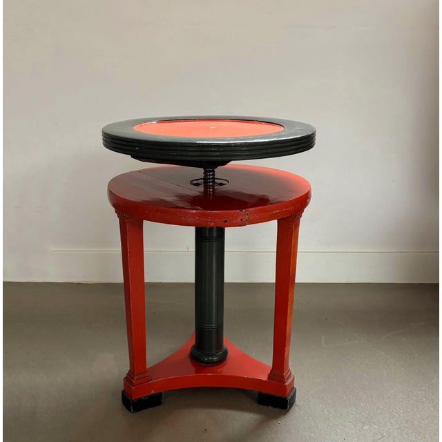 Nice Art Deco style (piano) stool in a green and orange paint, 1920/30s. Stool is adjustable in height and paint seems to...