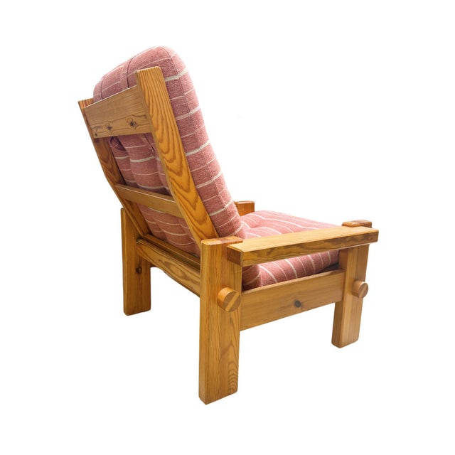 Vintage Swedish pinewood Dymling lounge chair by Yngve Ekström for Swedese of Sweden, circa 1970s. The chair features the...
