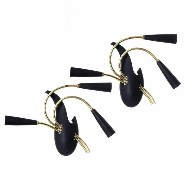 Pair of Italians wall lamps 20th Century Italian, circa 1950 with three lights in metal and other materials. Restored....