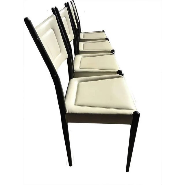 Vintage Italian design chairs 1960s Four chairs with sky fabric The height is 86 cm The seat height is 45 cm Wide is 46.5...