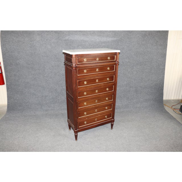 Dimensions: 55.5 inches high x 31 inches wide x 15.5 inches deep A finely executed antique French Louis XVI style high...