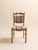 A beautifully crafted set of six Danish dining chairs featuring sculpted oak frames and gently curved ladder backs. The...