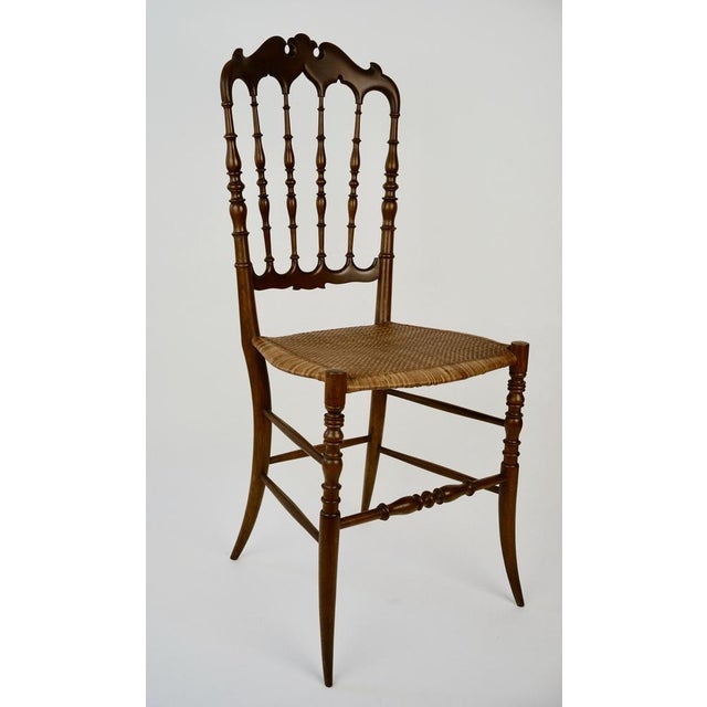 A decorative version of the Chiavari chair, the Parisienne, from 1950's, is a modern classic . Not only beautiful to the...