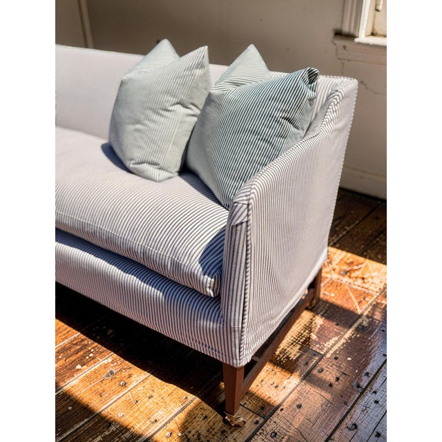 Elegant Vintage Sofa in great condition- completely reupholstered with new muslin base and removable blue and white...
