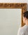 This mirror carries genuine presence, its gold gilt ornate carved frame, rectangular immediately setting the tone for the...