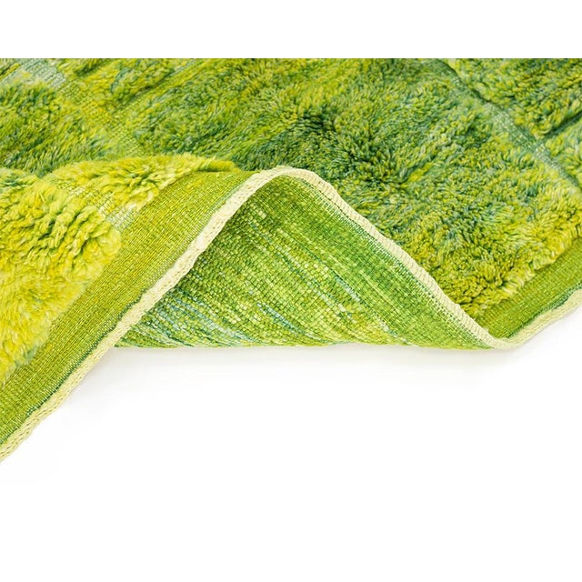Life, energy, and freshness — all underfoot. This vibrant hand-knotted Moroccan rug is an explosion of green vitality. A...