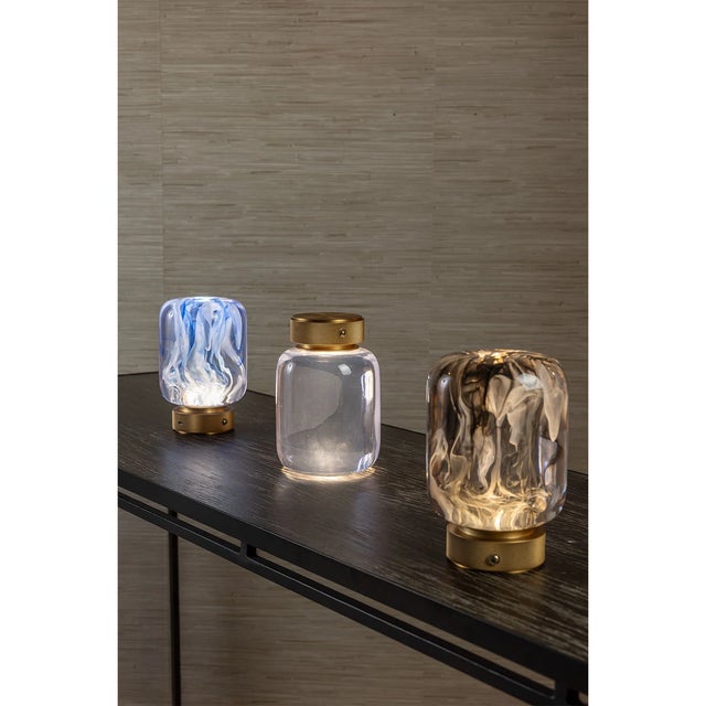 Dramatic. Moody. Unexpectedly --- no plug in wires! The LED charged Oceanic lamps offer flexibility on placement for the...