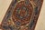 A traditional tribal Heriz rug hand-knotted with fine wool on a cotton foundation. This oriental rug features a central...