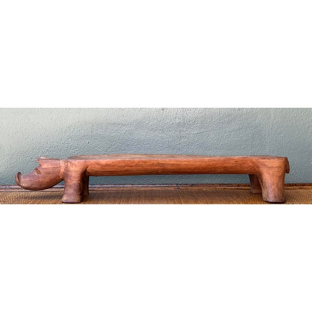 This exceptional hand-carved wooden tray showcases the charming simplicity of mid-century folk art. Meticulously shaped...