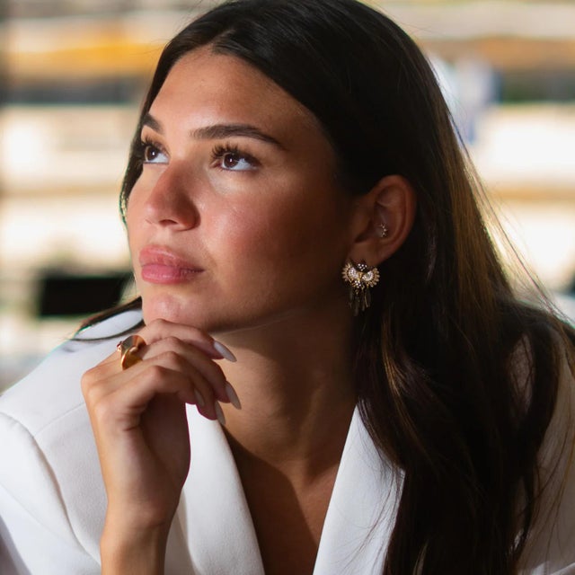 Step into the mystic beauty of the night with the Midnight Owl Sparkling Feather Earrings. Handcrafted from 925 sterling...