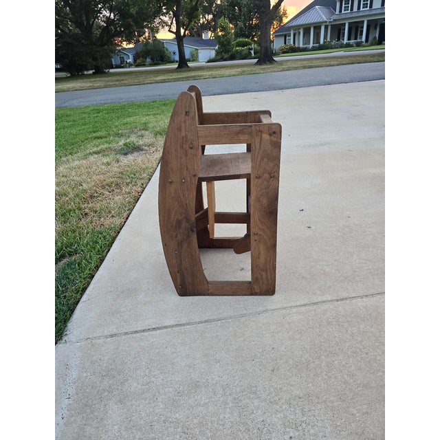 An exceptional example of American folk craftsmanship, this multi-functional 3-in-1 children's piece is a brilliant space-...