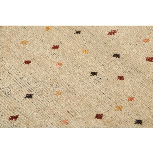 Hand-knotted in wool, this 2x3 rug is a new addition to the Burano Collection by Rug & Kilim—a bold and luxurious new...