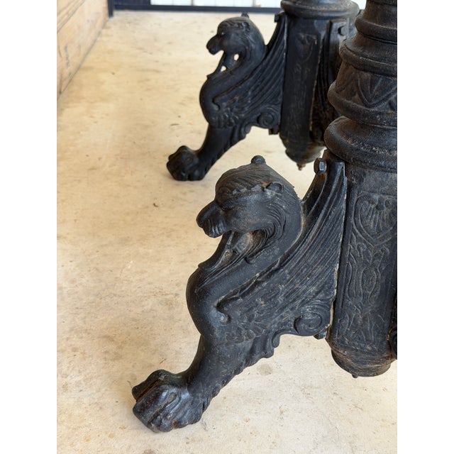 An exceptional and increasingly rare pair of antique cast iron garden pedestals, dating to the late 19th century and...