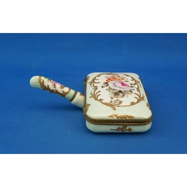 Fabulous small box with handle, an antique hand warmer in vitrified hard-paste porcelain, entirely hand-decorated with...
