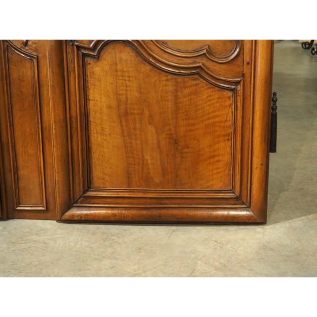 Dating to the period of Louis XV (circa 1750), this pair of walnut facades or cabinet doors were hand-carved in Provence,...