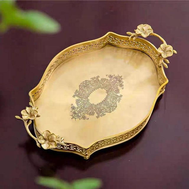 This ornate vintage tray features a lustrous, gilded finish (emulating aged antique metal) with dual 3D floral-shaped...