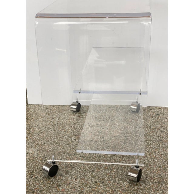 Vintage Hollis Jones Style Bar Cart Lucite Waterfall Style from a Palm Beach estate. Overall measurements are 26" w x 16"...