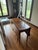Graceful drop-leaf wood table with tapered legs, shaped leaves and contrasting line inlay in the Federal and Hepplewhite...