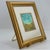 Original contemporary watercolor painting depicting a vibrant wildflower meadow beneath a dramatic turquoise sky....