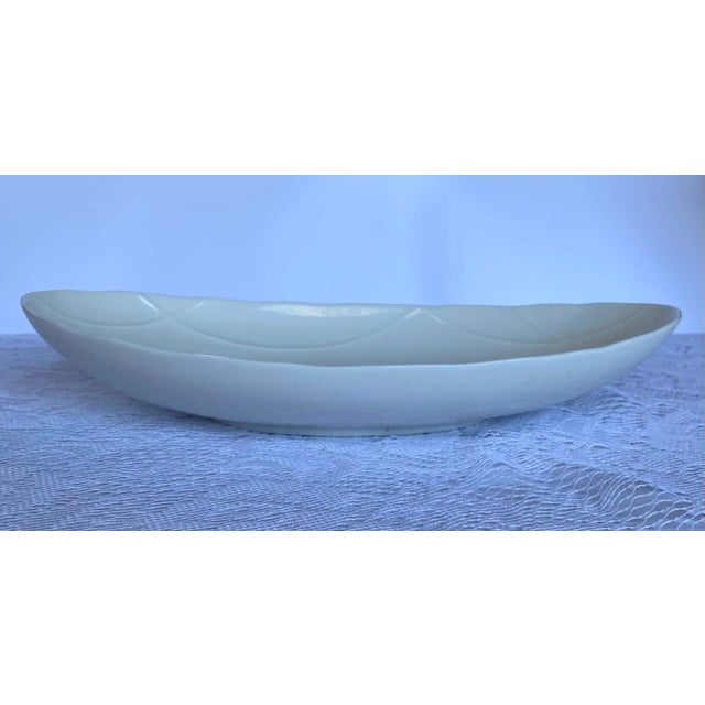 The TACHIKICHI Japan Oval Serving Bowl is undoubtedly a versatile addition to your tableware collection. Crafted in...