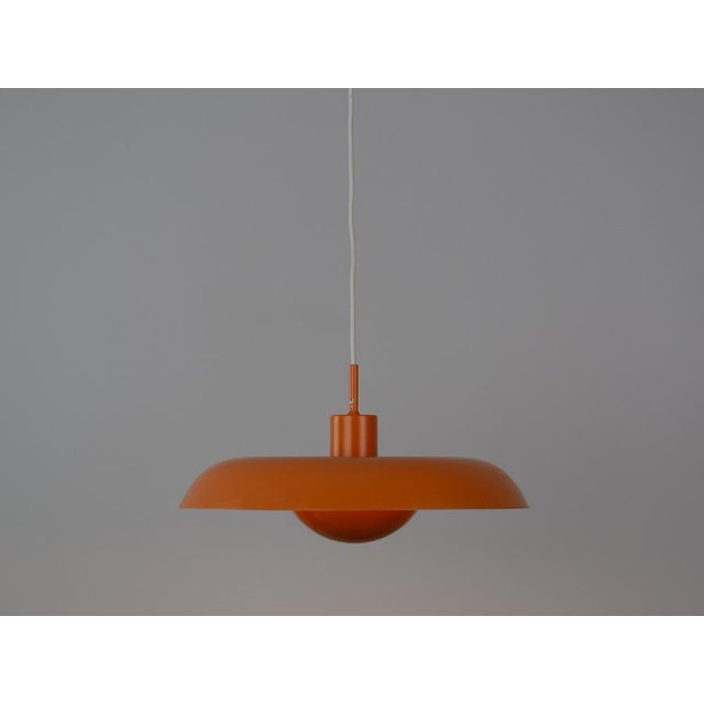 Minimalist RA pendant lamp, designed by Piet Hein in the 1940s, Dimensions: Height 20cm Diameter 40cm The lamp is in good...