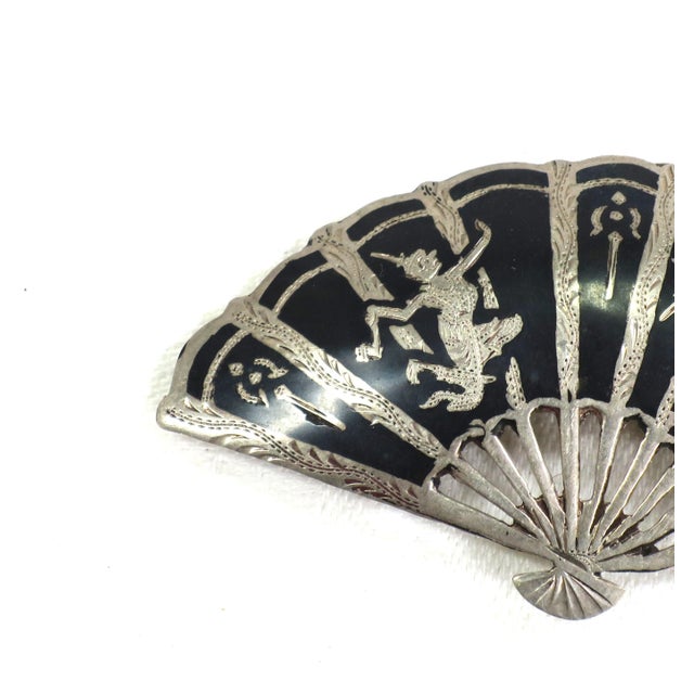 Vintage Siam sterling nielloware brooch, early 1940s. Fan design in classic silver and matte black nielloware work. The...