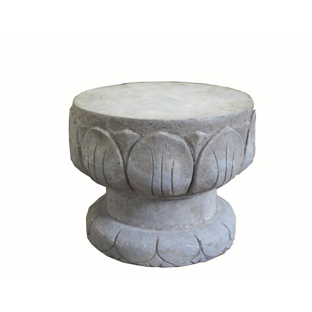 This beautiful stone pedestal enclosed with hand carved lotus leaves can be used as plant stand or garden stool or table....