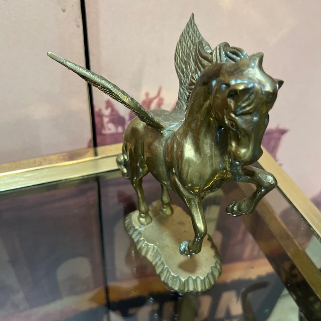 This gorgeous antique horse sculpture is perfect for any library or study and adds a touch of magic to wherever it is placed