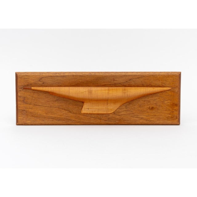 Vintage Half Hull Carved Wood Ship Model, mounted on wood plaque. Overall: 5.25" H x 16" W x 2.25" D. Provenance: From a...