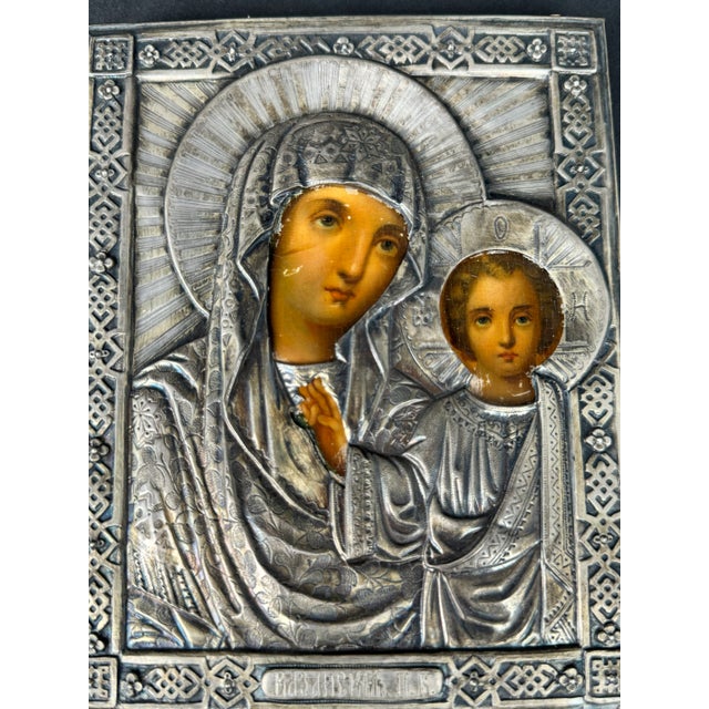 19th Century Russian Sterling Silver Icon An icon of the Virgin Mary and Christ Child. The icon dates back to the 19th...