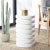 Add an eye-catching accent to your living area with our Kaysar Accent Table. Stacks of discs float onto each other to...