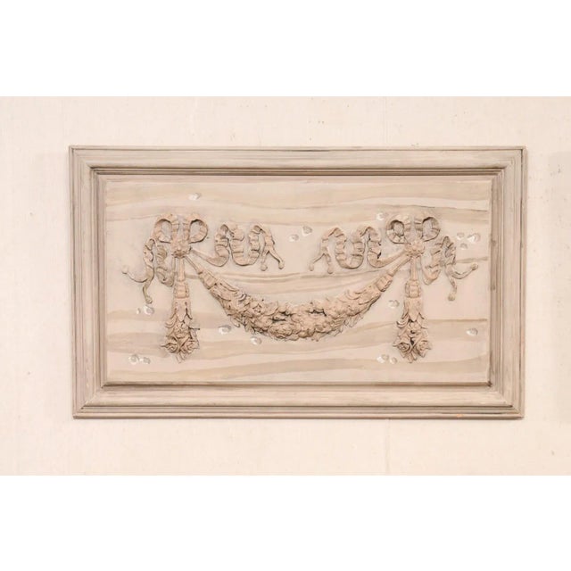 A French near-pair of decorative wall panels from the mid 20th century. These mid-century wall decorations from France,...