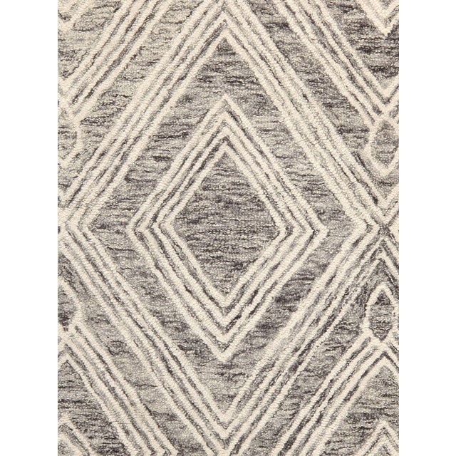 The brand Pasargad Home is the perfect blend of class and elegance. This tufted rug is from the Modern collection and...