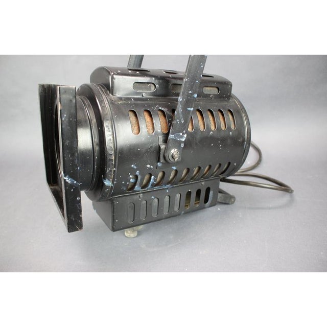 A rare and highly decorative vintage theater spotlight from czechoslovakia, manufactured by divadelní technika praha...