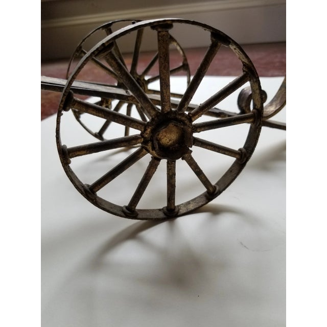 Great looking vintage Italian gilt metal finish wine bottle Holder with adjustable length and rolling wheels.