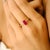 Add a bold yet refined touch to your jewelry collection with this exquisite 18K gold ruby solitaire ring. Featuring a...